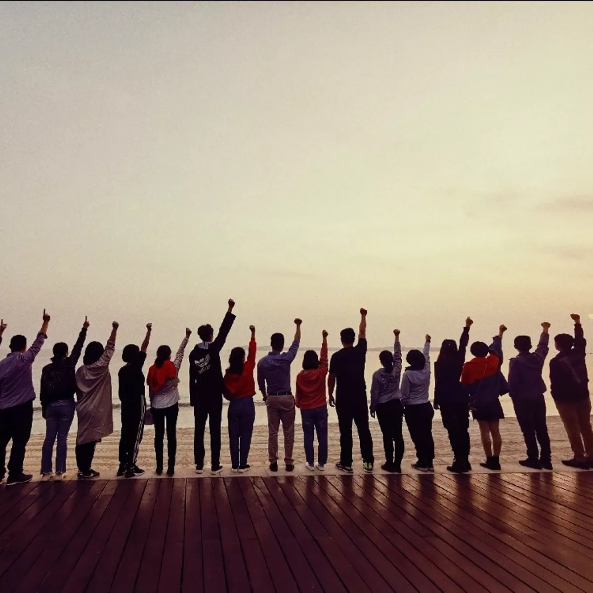 HOYA Surgical Optics launches new joint venture to meet the changing needs of ophthalmic surgeons in the People’s Republic of China - (people holding handing hands and jumping)